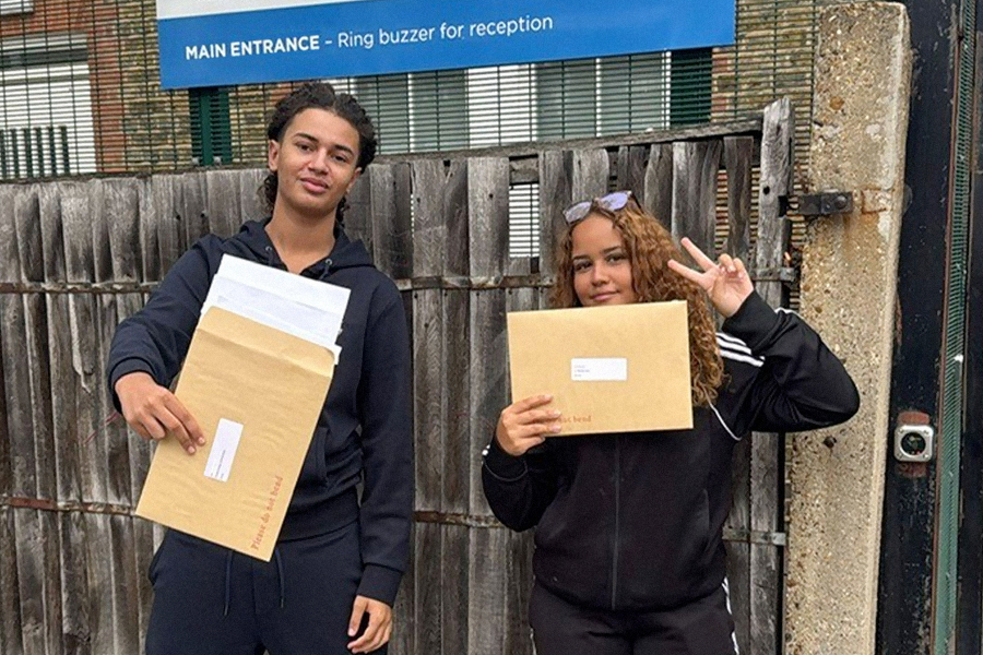 Students from Ormiston Bridge Academy celebrating their GCSE results