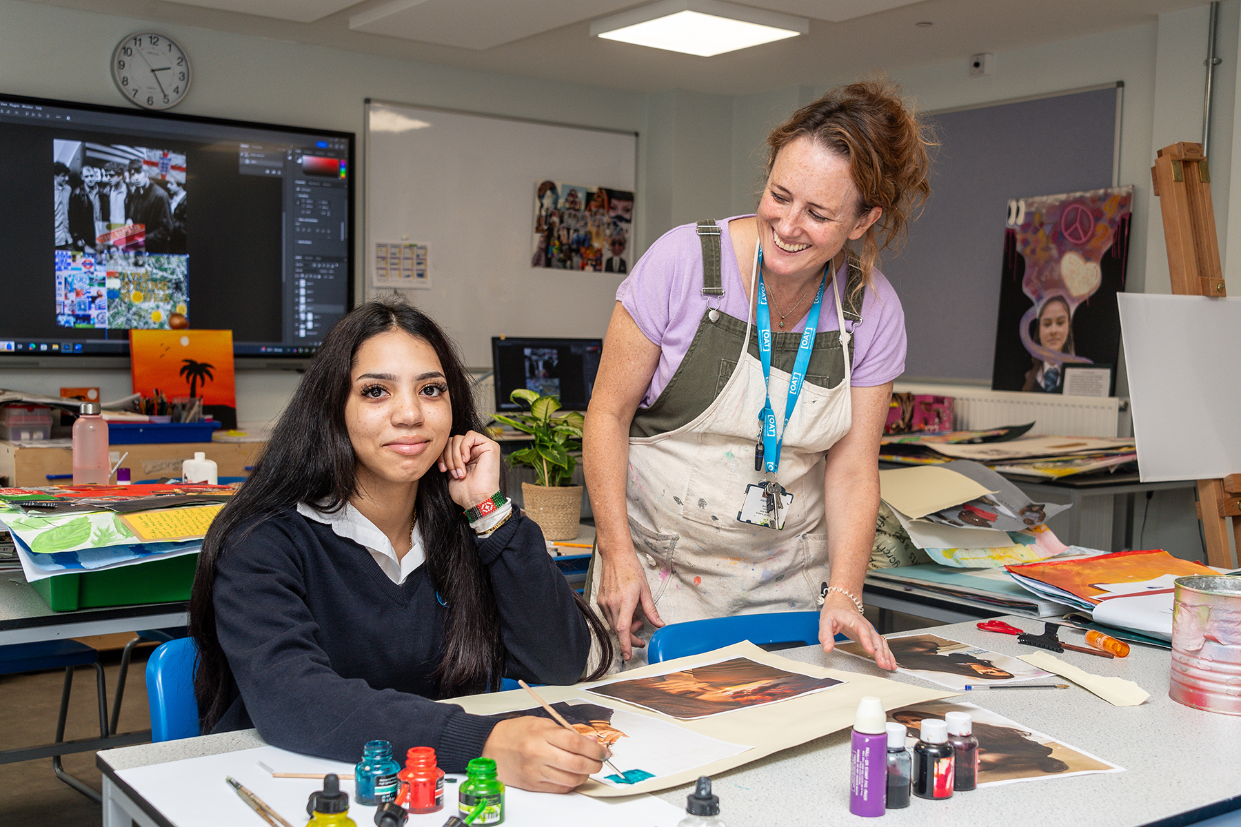 Ormiston Bridge Academy art classroom with student and teacher